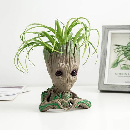 Vase, plant pot, plant heart in hands