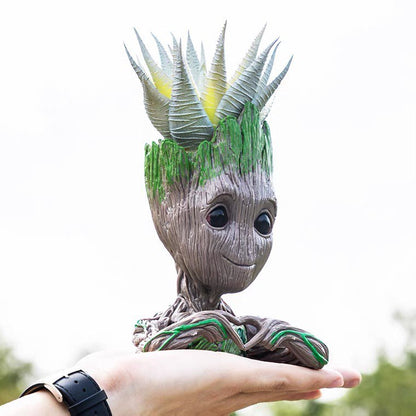 Vase, plant pot, plant heart in hands