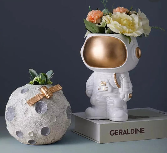 Astronaut figurine, plant pot