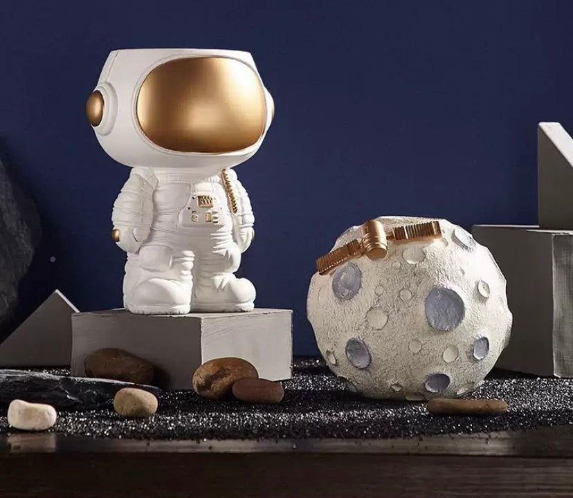 Astronaut figurine, plant pot