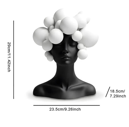 Black mannequin head with white bubble-like decorations, shown with measurements on a white background.