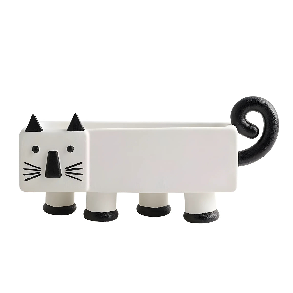 A white ceramic cat-shaped planter with black accents, including pointed ears, whiskers, nose, and a curled tail, shown on a plain white background.