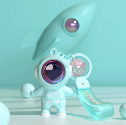 Astronaut keychain with flashlight green