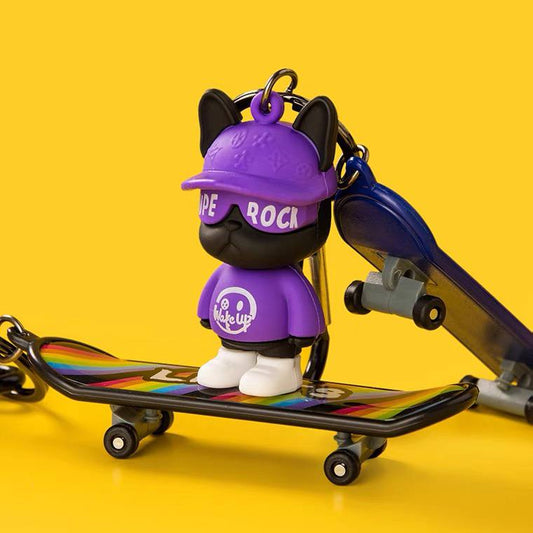 Keychain dog with skateboard purple