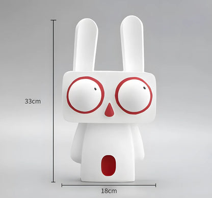 Product sizing diagram for the large white pop art rabbit figurine showing 33cm height and 18cm width against a gray background