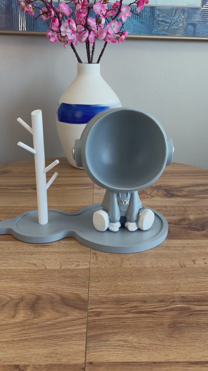 Figurine d'astronaute avec support pour petits objets, grise