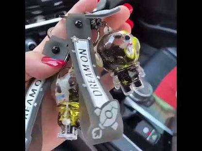 Keychain astronaut with guitar