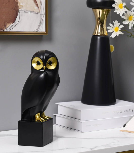 Black owl figurine