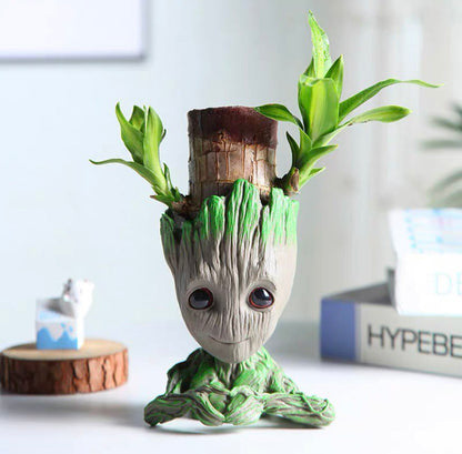 Vase, plant pot, plant heart in hands
